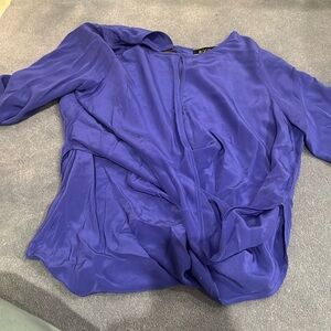 Purple silk top with gold buttons